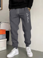 Men’s "BESTSELLER" Black Athletic Joggers – Stretch Running Pants with Drawstring